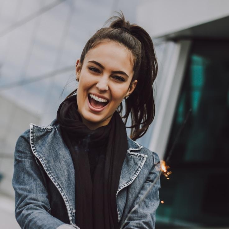 Alex Rivera, Lead Design Curator at Simple Island Bay, reviewing corporate floral arrangements